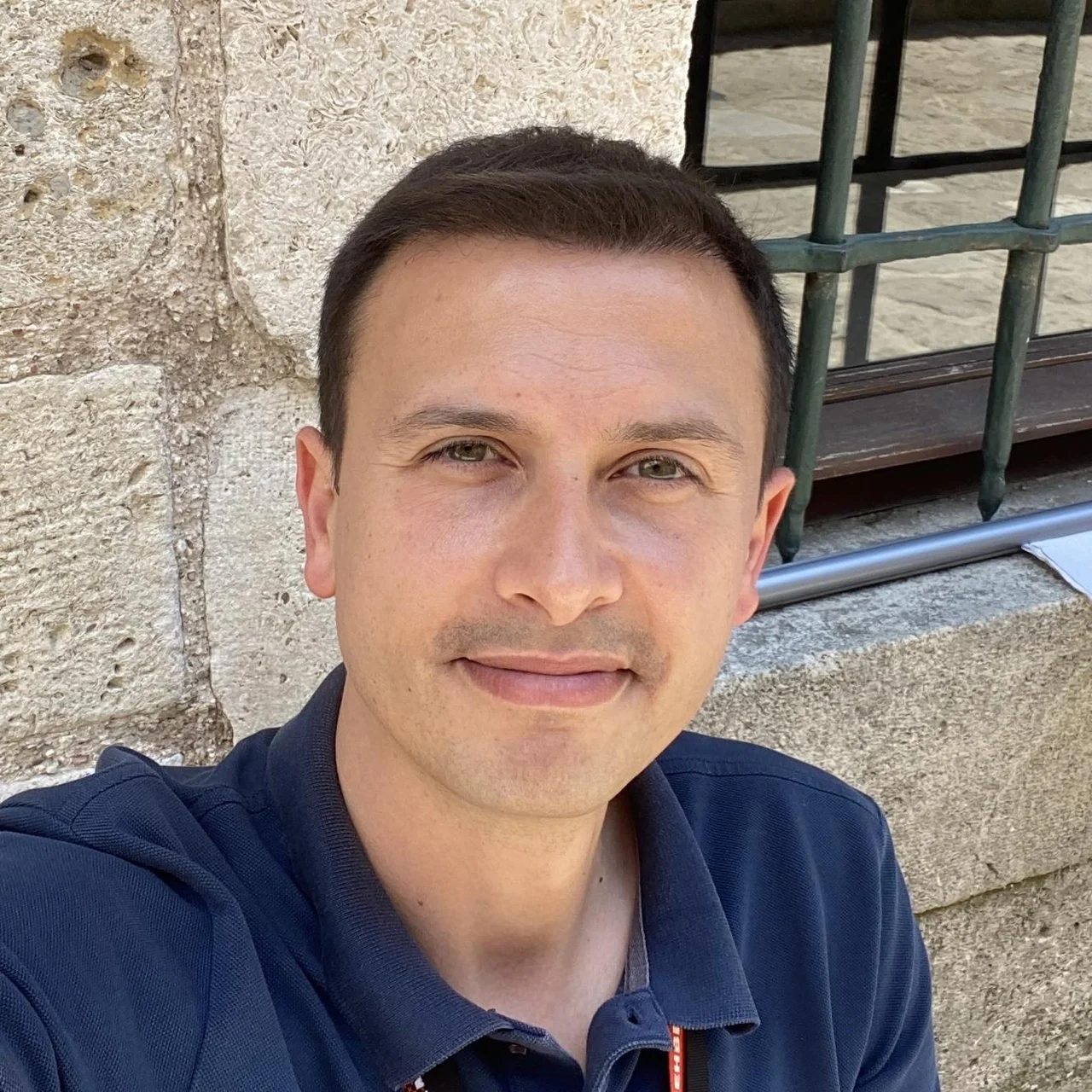 Muzaffer E.