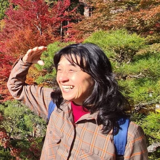 Mayumi E.